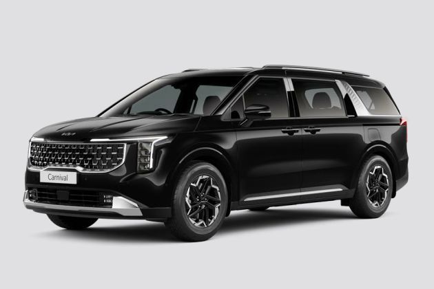 A black Kia Carnival people carrier