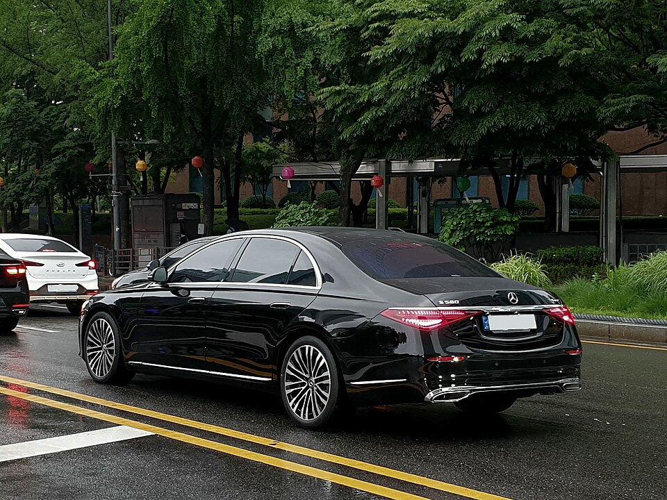 A black Mercedes-Benz S-Class saloon