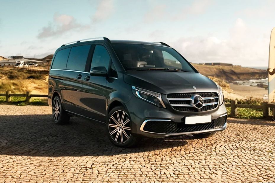 A dark grey Mercedes-Benz V-Class people carrier