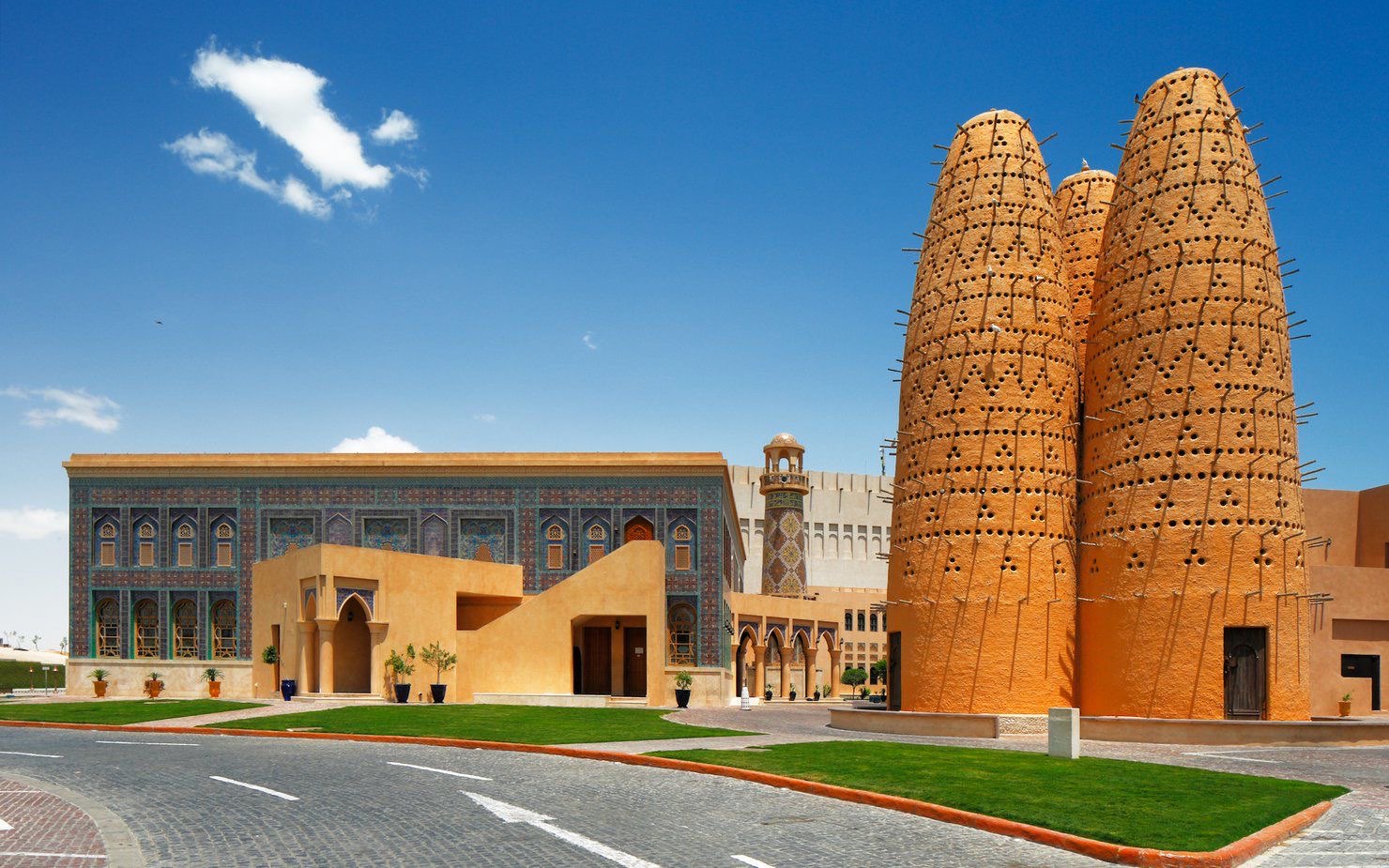 The mud-brick pigeon towers and tiled facades of Katara Cultural Village
