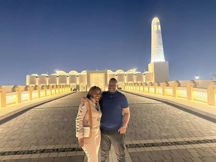 Guests on the esplanade at Katara as the golden mosque lights up